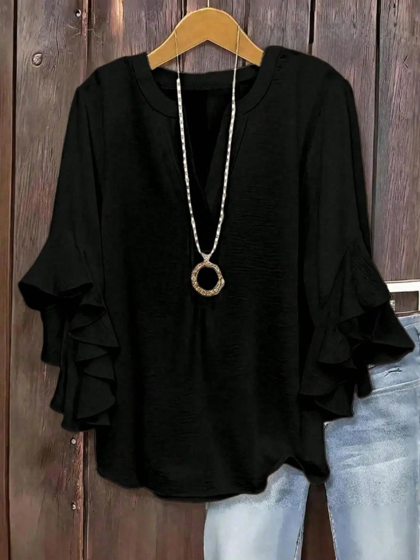 Blusa para mujer con escote en V y mangas acampanadas
