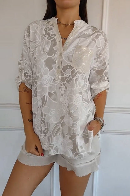 Blusa mujer floral con bolsillo de lentejuelas y botones