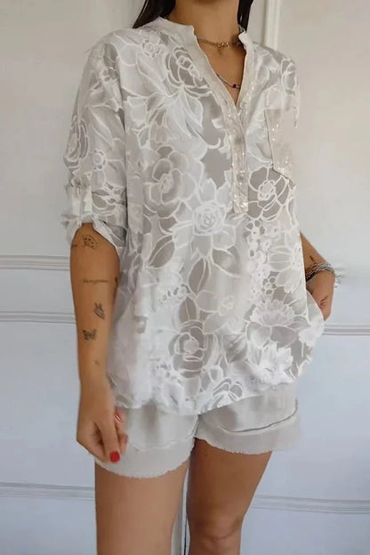 Blusa mujer floral con bolsillo de lentejuelas y botones