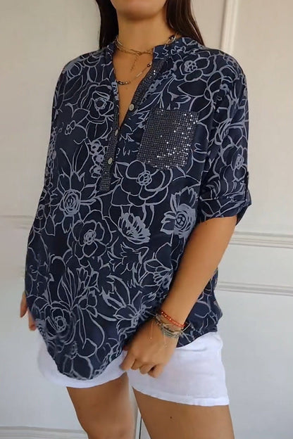 Blusa mujer floral con bolsillo de lentejuelas y botones