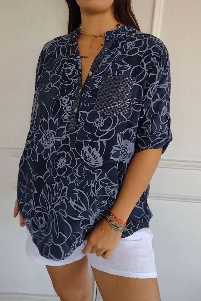 Blusa mujer floral con bolsillo de lentejuelas y botones