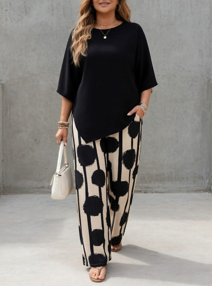 Conjunto de mujer con top asimétrico y pantalón estampado