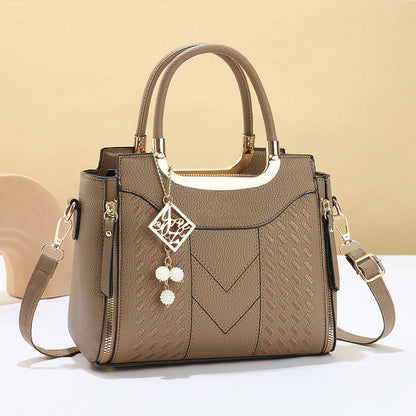 Bolso de mano mujer acolchado con bandolera ajustable