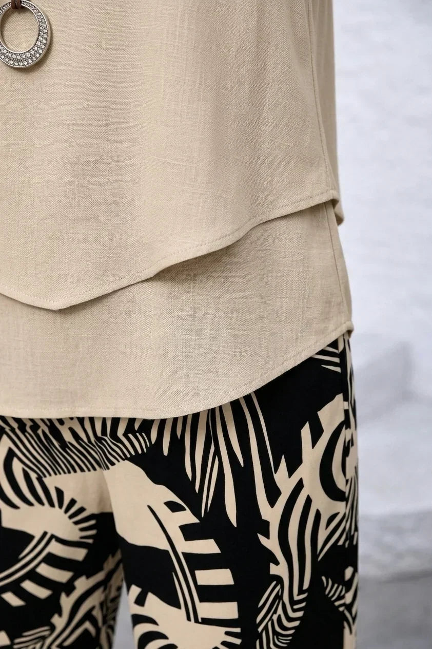 Conjunto de dos piezas mujer con top fluido y pantalón estampado