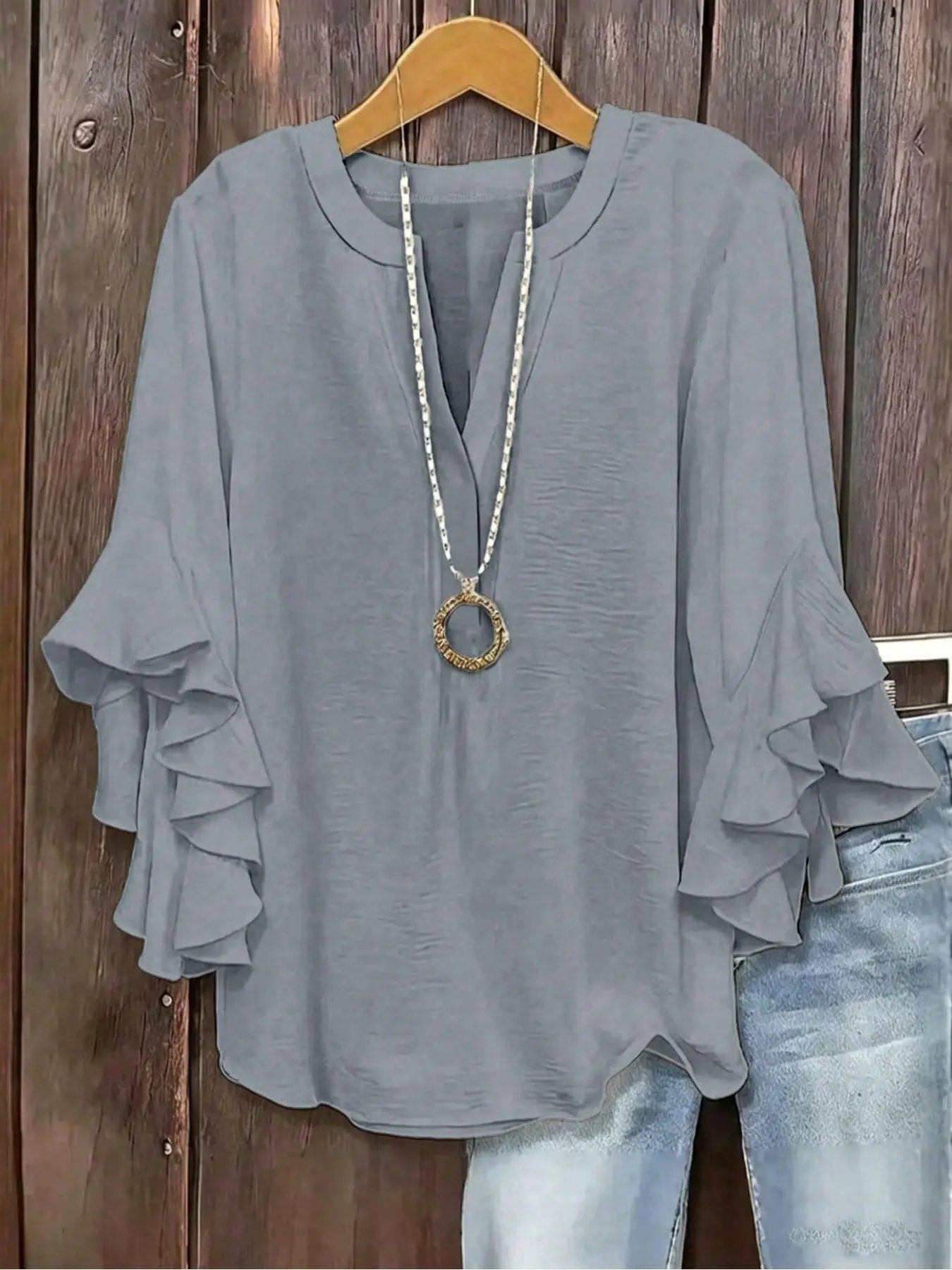 Blusa para mujer con escote en V y mangas acampanadas