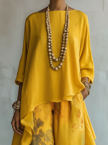 Conjunto mujer bohemio con blusa fluida asimétrica y pantalón floral