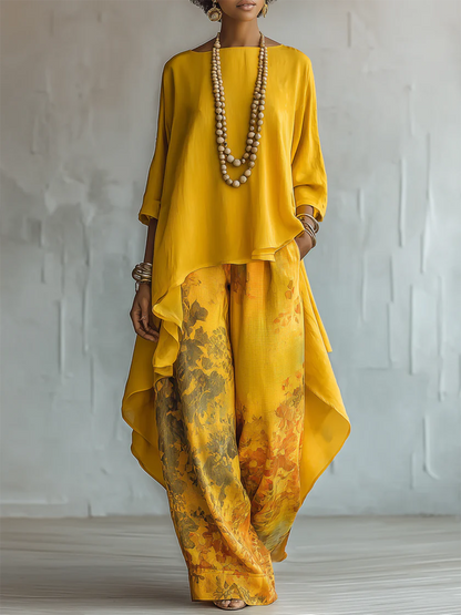 Conjunto mujer bohemio con blusa fluida asimétrica y pantalón floral