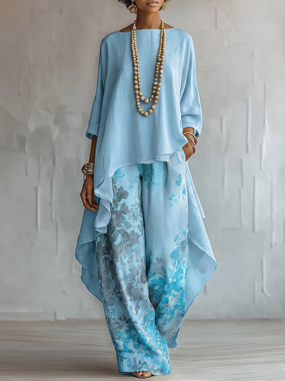 Conjunto mujer bohemio con blusa fluida asimétrica y pantalón floral