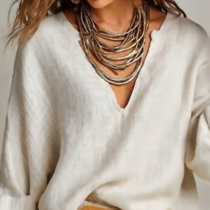 Conjunto mujer de dos piezas con blusa cuello en V y pantalón ancho
