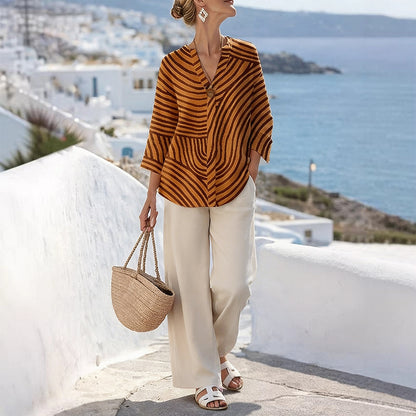 Conjunto mujer con blusa a rayas y pantalón ancho casual chic