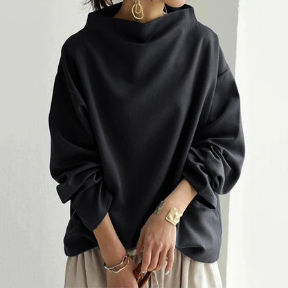 Top de punto para mujer con cuello alto y hombros caídos