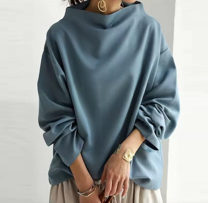 Top de punto para mujer con cuello alto y hombros caídos