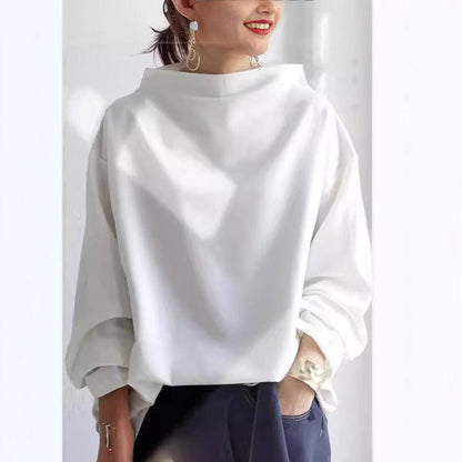Top de punto para mujer con cuello alto y hombros caídos