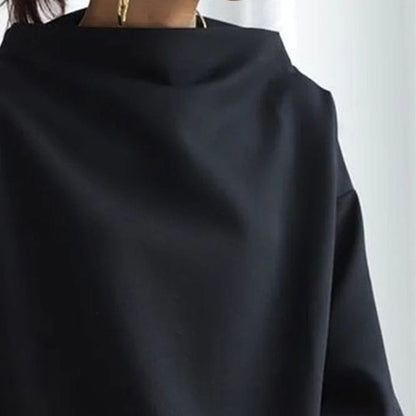 Top de punto para mujer con cuello alto y hombros caídos