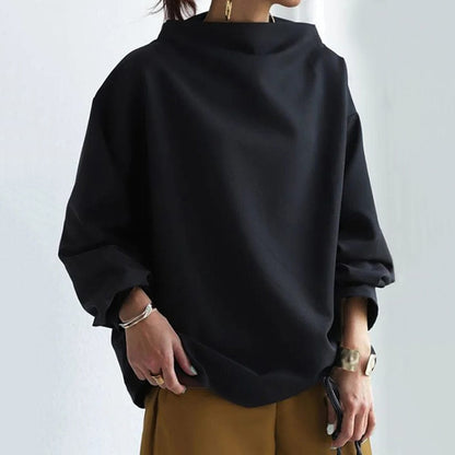 Top de punto para mujer con cuello alto y hombros caídos