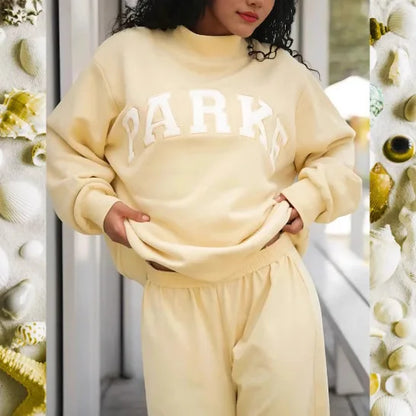Sudadera de punto para mujer con cuello perkins y letras universitarias