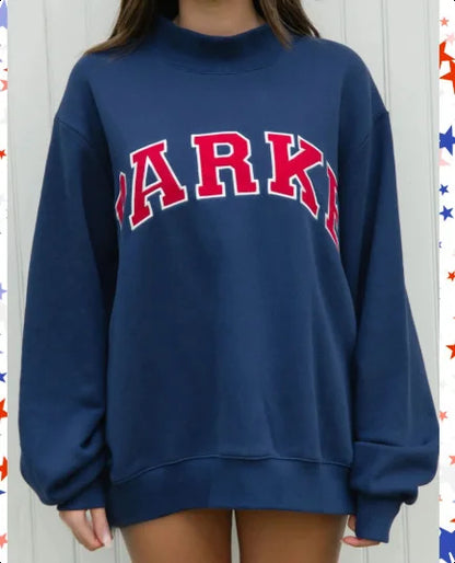Sudadera de punto para mujer con cuello perkins y letras universitarias